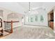 Spacious living room with vaulted ceilings, large windows, and natural light at 4509 Rosecliff Dr, Charlotte, NC 28277