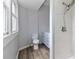 A full Bathroom featuring a window and shower at 531 Walnut St, Statesville, NC 28677