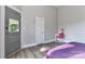 Bedroom with gray walls, hard wood floors and neutral paint at 531 Walnut St, Statesville, NC 28677
