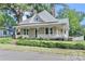 Charming home featuring a welcoming front porch and a well-maintained landscaped yard at 531 Walnut St, Statesville, NC 28677