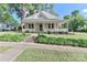 Attractive single-Gathering home with a charming porch, brick chimneys, a well-kept lawn, and inviting curb appeal at 531 Walnut St, Statesville, NC 28677