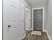 Hallway with neutral colors and wood-look flooring at 531 Walnut St, Statesville, NC 28677