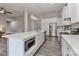 Contemporary kitchen with stainless appliances, a large island, and wood floors at 531 Walnut St, Statesville, NC 28677