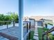 View of a backyard with a wood deck, blue shed, and stone paver pathway at 541 Jetton St, Davidson, NC 28036