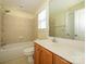 Clean bathroom features tile floors, a tub-shower, and modern vanity at 541 Jetton St, Davidson, NC 28036