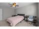 Neutral bedroom with carpet, fan, desk, and natural light at 5621 Tipperlinn Way, Charlotte, NC 28278