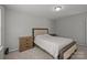 Cozy bedroom featuring a full bed, soft carpet and light from the window at 5621 Tipperlinn Way, Charlotte, NC 28278