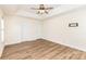Bright bedroom with a ceiling fan, hardwood floors, and natural light streaming in from the window at 5706 Sustar Dr, Monroe, NC 28110