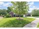 Traditional brick home with a lush green lawn and two-car garage at 5706 Sustar Dr, Monroe, NC 28110