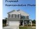Charming two-story home featuring a classic design with a front-facing garage and welcoming porch at 6308 Honor Ave, Midland, NC 28107