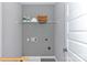 Efficient laundry room with practical shelving and utility connections, ready for appliances at 6308 Honor Ave, Midland, NC 28107