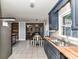Open concept kitchen with stainless steel appliances and access to the dining and living areas at 70 Cumberland Sw Ct, Concord, NC 28025