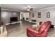 Inviting living room with hardwood floors, neutral walls, and access to the entryway at 70 Cumberland Sw Ct, Concord, NC 28025