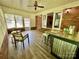Sunroom featuring brick accents, ample windows, and lots of natural light at 70 Cumberland Sw Ct, Concord, NC 28025