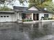 Charming brick home features a covered porch and attached garage at 713 Sloop Ave, Kannapolis, NC 28083