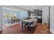 Eat in kitchen with stainless steel appliances, dark cabinets, and breakfast bar for casual dining at 7332 Newsome Sw Ct, Concord, NC 28025