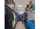Walk-in closet with custom shelving, hanging racks, and plenty of storage space at 7332 Newsome Sw Ct, Concord, NC 28025