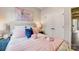 Comfortable bedroom with tasteful decor and plenty of natural light at 743 Hoke Ln, Davidson, NC 28036