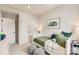 Decorated bedroom with accent wallpaper and comfortable bed at 743 Hoke Ln, Davidson, NC 28036