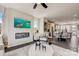 Open concept living room and kitchen featuring sleek fireplace, modern decor, and a seamless flow between spaces at 743 Hoke Ln, Davidson, NC 28036