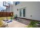 Backyard patio with wooden fence, basketball hoop, and potted plants at 937 Anchor Ne Way, Kannapolis, NC 28083