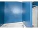 Bathroom with shower over tub and blue walls at 937 Anchor Ne Way, Kannapolis, NC 28083