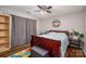 Bedroom with hardwood floors, a decorative rug, and a ceiling fan at 937 Anchor Ne Way, Kannapolis, NC 28083