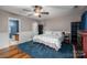Carpeted bedroom with connecting bathroom, and hardwood trim at 937 Anchor Ne Way, Kannapolis, NC 28083
