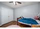 Bedroom featuring hardwood floors, a double closet, and natural light at 937 Anchor Ne Way, Kannapolis, NC 28083