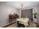 Bright dining room with wooden table and vinyl record player stand at 937 Anchor Ne Way, Kannapolis, NC 28083