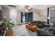 Cozy living room with hardwood floors, seating, and natural light at 937 Anchor Ne Way, Kannapolis, NC 28083
