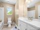 Bathroom featuring a white vanity and natural light from the window at 9430 Peckham Rye Rd, Mint Hill, NC 28227