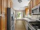 The kitchen is equipped with stainless steel appliances and ample cabinet space at 9430 Peckham Rye Rd, Mint Hill, NC 28227