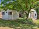 Charming storage sheds nestled among mature trees offering ample space for tools and equipment at 9430 Peckham Rye Rd, Mint Hill, NC 28227