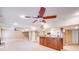 Basement with kitchen and bar area, and a ceiling fan at 9433 Stonebridge Way, Mint Hill, NC 28227