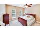 Cozy bedroom featuring neutral walls, carpet, and classic wood bedroom set at 9433 Stonebridge Way, Mint Hill, NC 28227