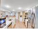 Kitchen featuring stainless steel appliances, white cabinets, and lots of light at 9433 Stonebridge Way, Mint Hill, NC 28227
