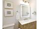 Bathroom with lighted mirror, modern vanity, and stylish fixtures at 9596 Pacing Nw Ln, Concord, NC 28027
