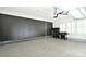 Garage with epoxy floor and built in dark cabinets at 9596 Pacing Nw Ln, Concord, NC 28027
