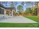Expansive backyard with a swing set, playhouse, and ample green space for recreation at 10125 Bethel Church Rd, Midland, NC 28107