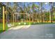 Spacious backyard with swing set and playground, perfect for outdoor fun at 10125 Bethel Church Rd, Midland, NC 28107