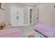 Shared room with twin beds, white trim, and a closet; perfect for siblings or guests at 10125 Bethel Church Rd, Midland, NC 28107