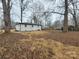 Spacious backyard showcasing the property's well-maintained exterior and ample space at 106 Greentree Dr, Mount Holly, NC 28120