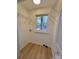Small closet space with wire shelving and a window for natural light at 106 Greentree Dr, Mount Holly, NC 28120