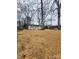 Well-maintained front yard leading to a charming home with great curb appeal at 106 Greentree Dr, Mount Holly, NC 28120