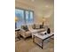 Cozy living room featuring comfortable seating, lamps, and stylish decor at 106 Greentree Dr, Mount Holly, NC 28120