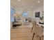 Inviting living room and dining area with new floor, modern furniture, and natural light at 106 Greentree Dr, Mount Holly, NC 28120