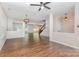 Hardwood floor living room featuring an open floor plan, lots of light and modern fixtures at 1071 Bassett Way, Fort Mill, SC 29707