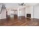 Spacious living room with hardwood floors, fireplace, and an open floor plan at 1071 Bassett Way, Fort Mill, SC 29707