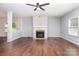 Bright living room featuring a fireplace, hardwood floors and neutral paint at 1071 Bassett Way, Fort Mill, SC 29707